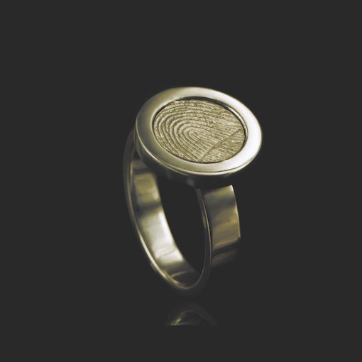gouden ring met ronde vingerafdruk en 5 zirkonia stenen
